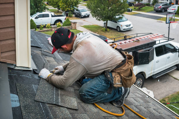 Professional Emergency Roof Repair technician working in Madera, PA